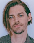 Ficha de Tom Payne